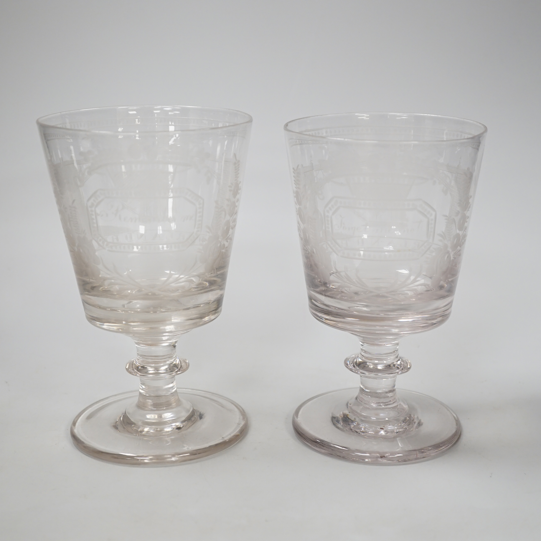 A pair of Sunderland Bridge rummers, c.1800-1820, with bucket bowls, blade knops and rough pontils, engraved with bridge and sailing ship passing below, panels are engraved in script ‘Forget me not’ and ‘Remember me’ Eng